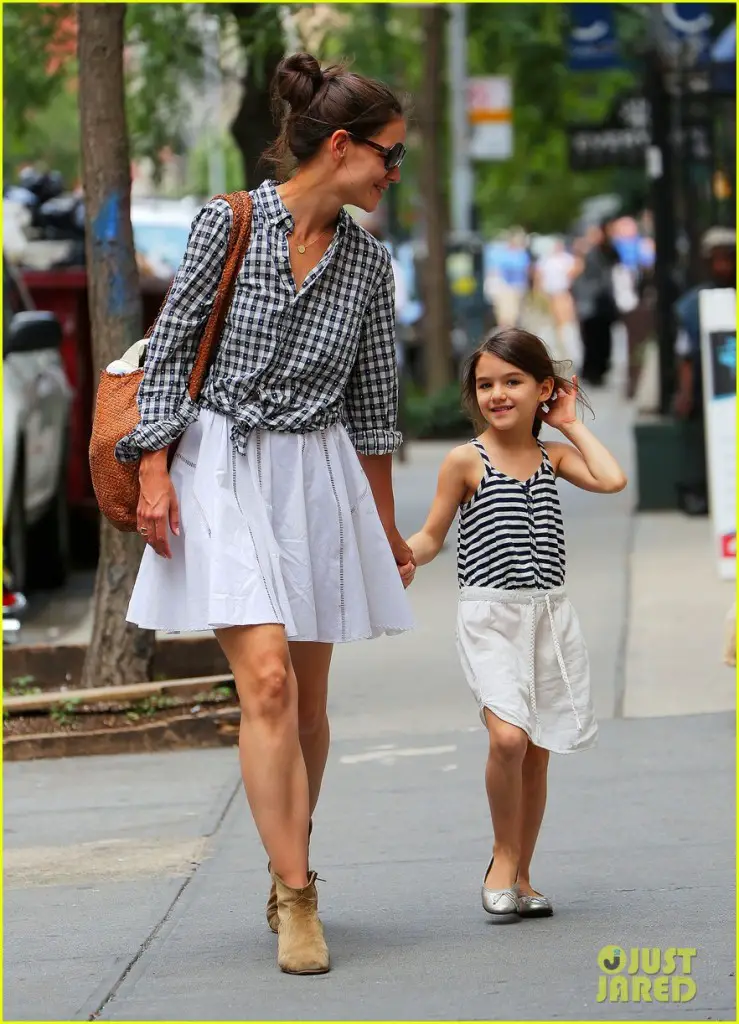 Suri Cruise strikes a pose for the camera as she takes a stroll in NYC