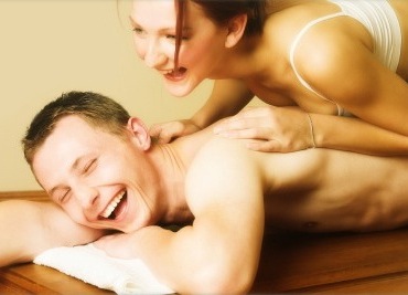 Couple having fun during a massage