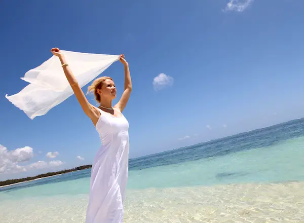 Bride on the beach with white stole