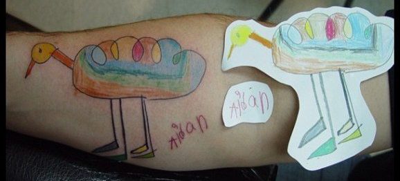 des-parents-se-font-tatouer-les-dessins-de-leur-enfant3